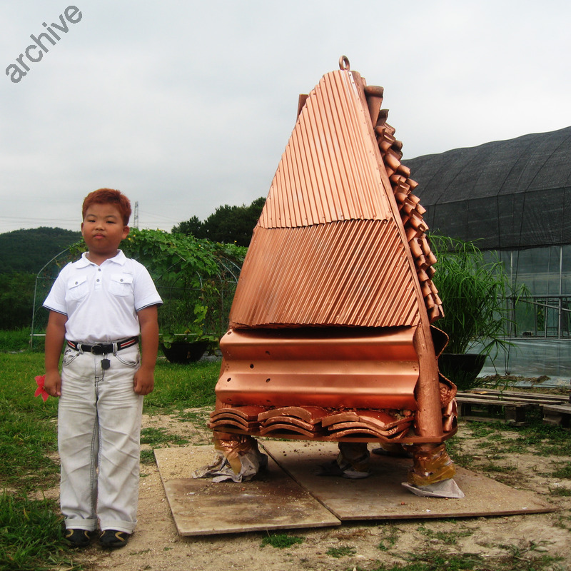 Mobilosan - 2.10 x 1.20 x 1.20 m, wood, earth, ceramic roof tiles, iron, nylon, bronze paint, plants